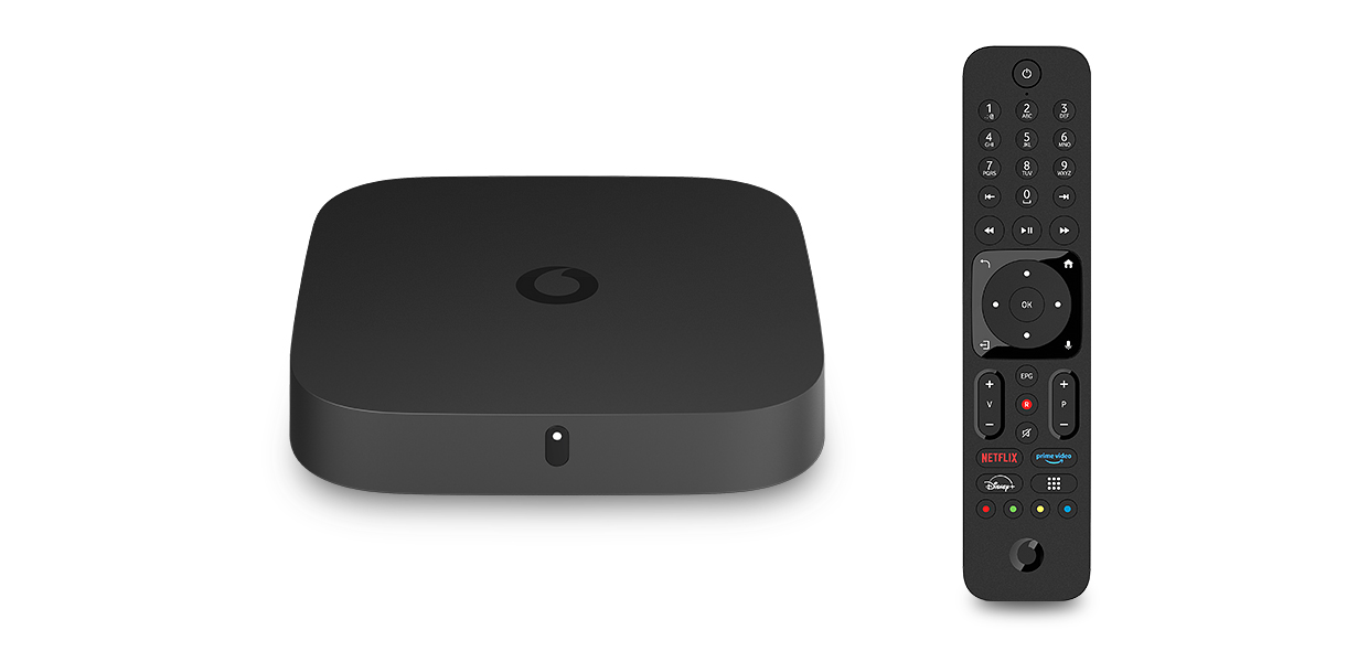 Home Box Ansicht von Oben inklusive Fernbedienung daneben