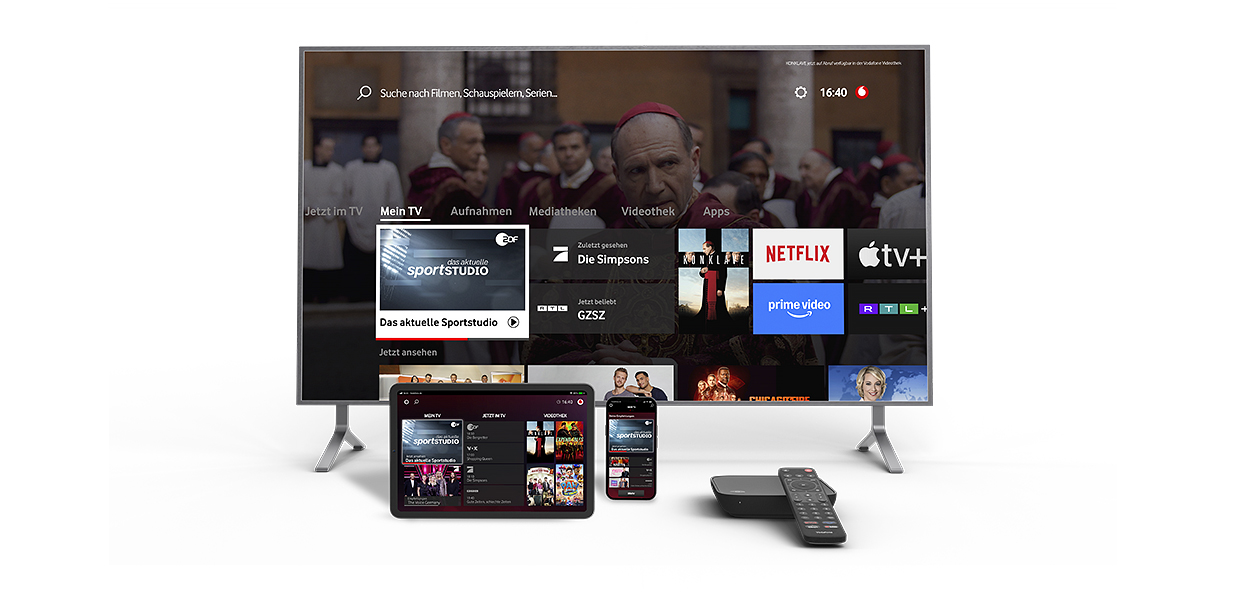 Produktfoto: GigaTV Home Box mit Fernbedinung in Collage mit einem TV, Tablet und Smartphone.