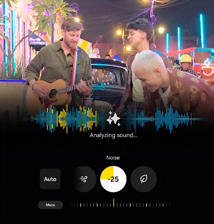 In einem Video sind Personen zu sehen, die in der Mitte von einer Darstellung der Schallwellen �berlagert werden. In der Audio-Radierer werden St�rger�usche ausgew�hlt, die von 0 bis minus 100 reduziert werden k�nnen. Bei minus 100 wird die Stummschaltung angezeigt.